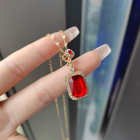 Beautiful Golden necklace with big Red Stone