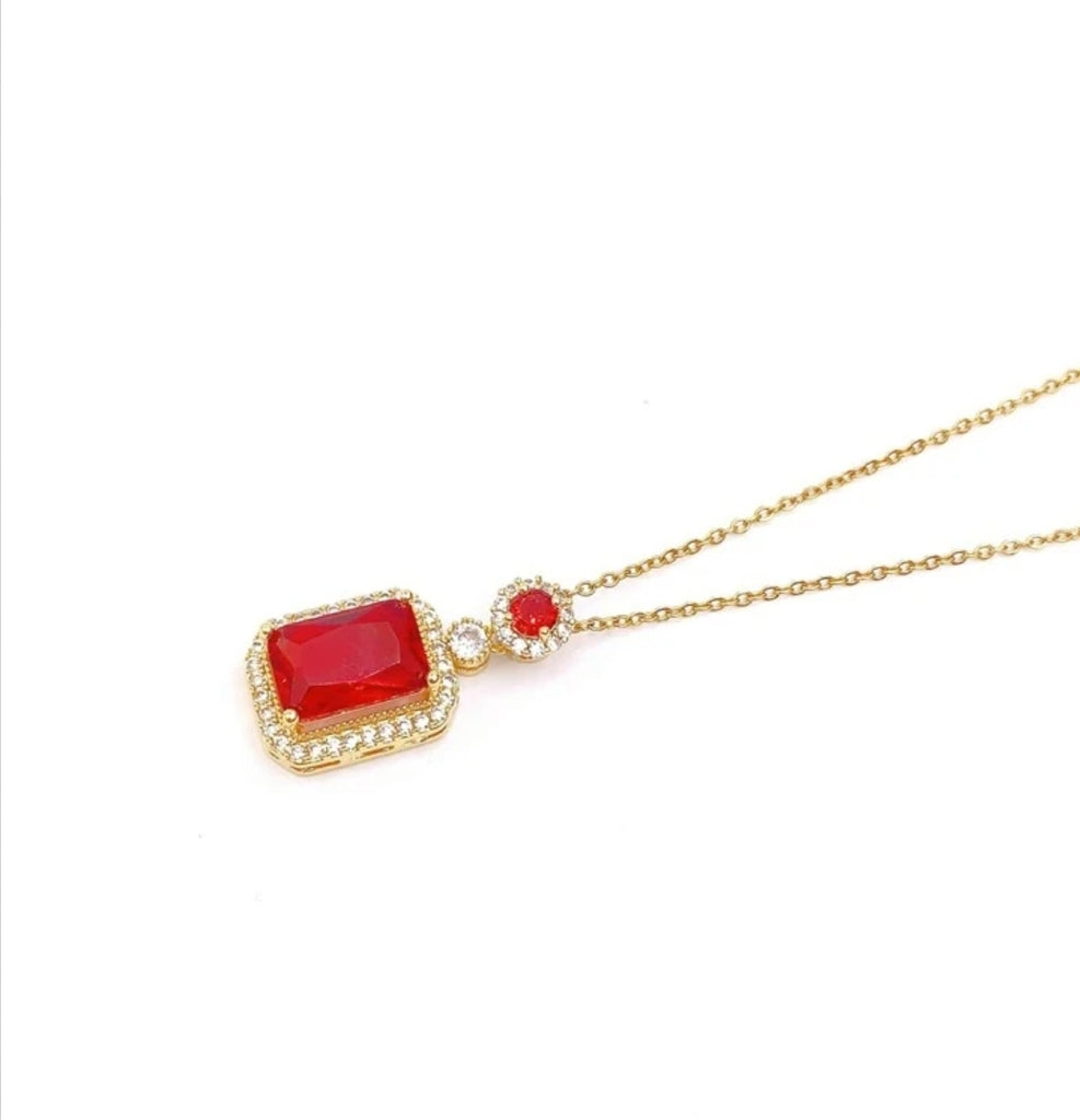 Beautiful Golden necklace with big Red Stone