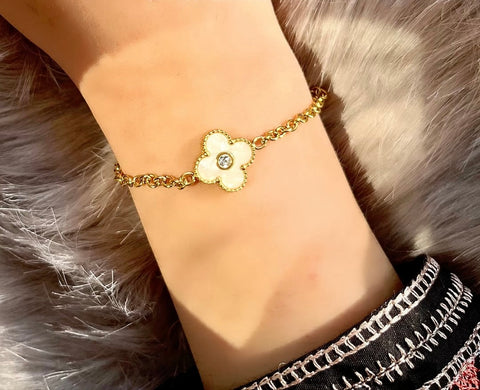 Stainless steel 18k gold plated Ladies bracelet with White flower