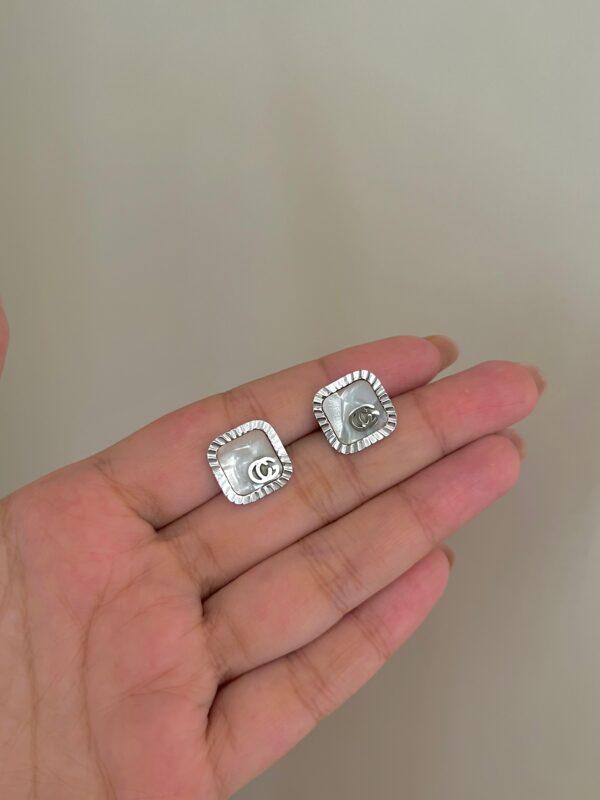 Stainless steel marble gg studs - Buy Online Pakistan | Crazy Women